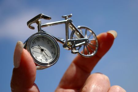 Time in hand.The Souvenir - a watch in the manner of small bicycle. The Subject is found in hand on...
