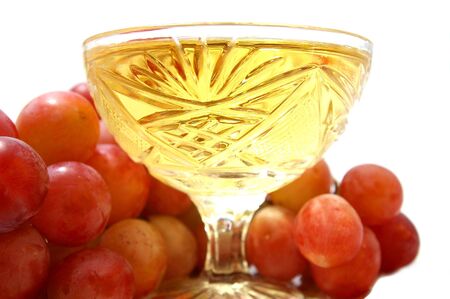 Wine and grape, still life close-up on white background.の写真素材