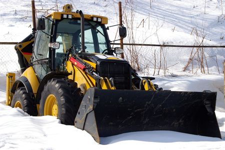 Tractor of the wanted color costs in snow