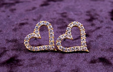 Earrings-heart on velvetの写真素材