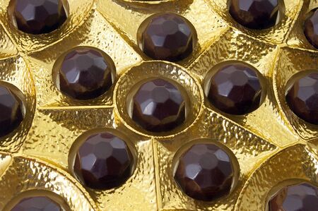 Chocolates in golden packing    の写真素材
