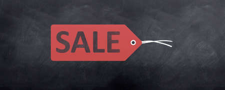 A sale tag is sketched on the blackboard with twine hanging offの写真素材
