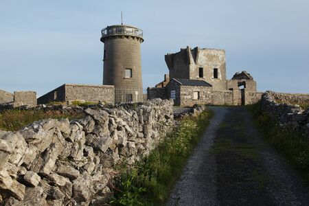 Ruins of old Dun Oghil Lighthouse on Inishmore on Aran Islandsの写真素材