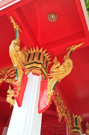 Statue of birds on pillar in Temple of The Wat Rhai Pa, Trat, Thailandの写真素材