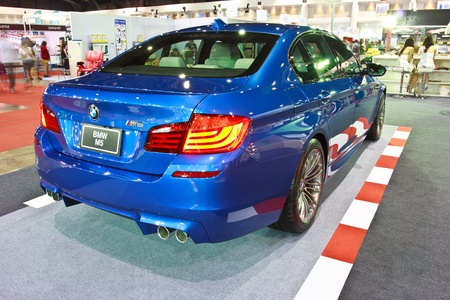 BANGKOK - JUNE 23 : BMW M5 show at The second Bangkok International Auto Salon 2013, the largest and most magnificent Modified Car and automobile accessories show in Bangkok, Thailand.のeditorial素材