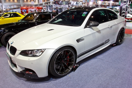 BANGKOK - JUNE 23 : White BMW show at show at The second Bangkok International Auto Salon 2013, the largest and most magnificent Modified Car and automobile accessories show in Bangkok, Thailand.のeditorial素材