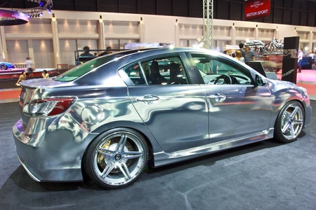 BANGKOK - JUNE 23 : NEW MAZDA 3  show at the second Bangkok International Auto Salon 2013, the largest and most magnificent Modified Car and automobile accessories show in Bangkok, Thailand.のeditorial素材