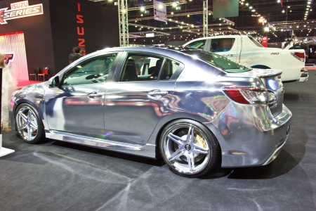 BANGKOK - JUNE 23 : NEW MAZDA 3  show at the second Bangkok International Auto Salon 2013, the largest and most magnificent Modified Car and automobile accessories show in Bangkok, Thailand.のeditorial素材