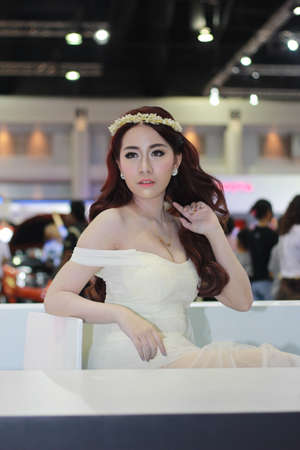 BANGKOK, THAILAND - MARCH 30, 2014  Unidentified female presenter pose in the 35th Bangkok International Motor Show on March 30, 2014 in Nonthaburi, Thailand のeditorial素材