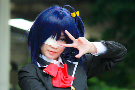 Bangkok - Aug 31: An unidentified Japanese anime cosplay Takanashi Rikka pose  on August 31, 2014 at...