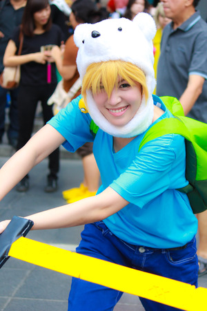 Bangkok - Aug 31: An unidentified Japanese anime cosplay pose  on August 31, 2014 at Central World, Bangkok, Thailand.のeditorial素材
