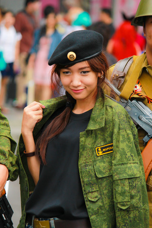 Bangkok - Aug 31: An unidentified Japanese anime cosplay pose  on August 31, 2014 at Central World, Bangkok, Thailand.のeditorial素材