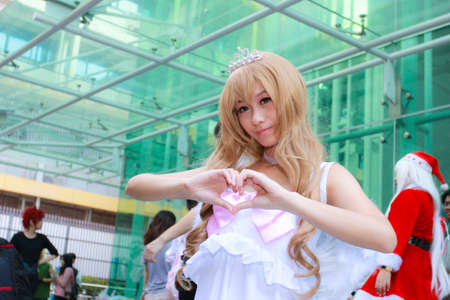 Bangkok - Dec 28: An unidentified Japanese anime cosplay pose  in COSCOM EXTRA : Christmas  on...