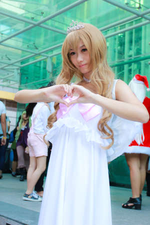 Bangkok - Dec 28: An unidentified Japanese anime cosplay pose  in COSCOM EXTRA : Christmas  on...