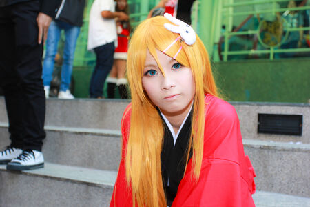 Bangkok - Dec 28: An unidentified Japanese anime cosplay pose  in COSCOM EXTRA : Christmas  on...