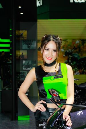 BANGKOK, THAILAND - APRIL 09, 2017: Unidentified female presenter pose in the 38th Bangkok International Motor Show on April 09, 2017 in Bangkok, Thailand.のeditorial素材
