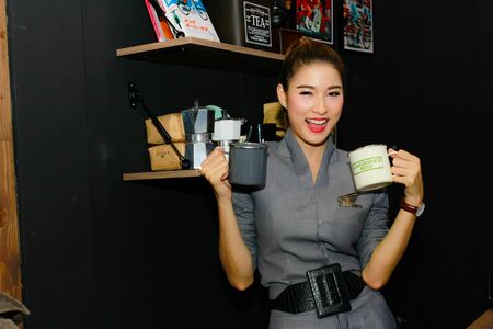 BANGKOK, THAILAND - APRIL 09, 2017: Unidentified female presenter pose in the 38th Bangkok International Motor Show on April 09, 2017 in Bangkok, Thailand.のeditorial素材