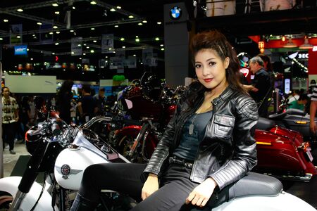 BANGKOK, THAILAND - APRIL 09, 2017: Unidentified female presenter pose in the 38th Bangkok International Motor Show on April 09, 2017 in Bangkok, Thailand.のeditorial素材