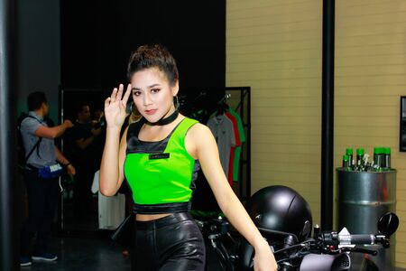 BANGKOK, THAILAND - APRIL 09, 2017: Unidentified female presenter pose in the 38th Bangkok International Motor Show on April 09, 2017 in Bangkok, Thailand.のeditorial素材