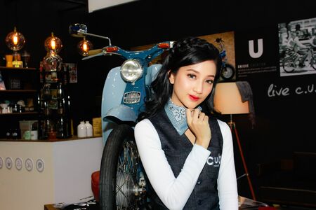 BANGKOK, THAILAND - APRIL 09, 2017: Unidentified female presenter pose in the 38th Bangkok International Motor Show on April 09, 2017 in Bangkok, Thailand.のeditorial素材