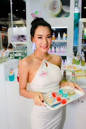 BANGKOK, THAILAND - JUNE 02, 2018: Unidentified female presenter pose in the THAIFEX - World of food asia 2018 on JUNE 02, 2018 in Bangkok, Thailand.のeditorial素材