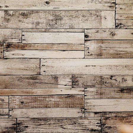 Gray ceramic tile with geometric pattern for wall decor. Concrete stone background. Texture with horizontal panels imitating wooden surface for interior design project.の写真素材