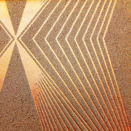 Brown ceramic tile with abstract pattern for wall and floor decoration. Concrete stone surface background. Texture for interior design project.の写真素材