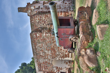 historical fort with a cannon in frontの写真素材