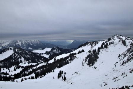 mountain scenery with low cloud cover in winterの写真素材