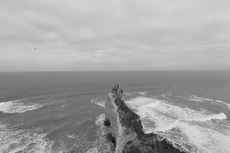 Black and white view of the cliffs on the Atlantic ocean in Portugalの写真素材