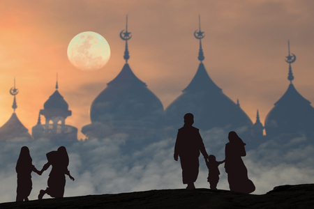 Family Muslims  pray for God  in Ramadan with hope and forgiveness of the background the mosqueの写真素材