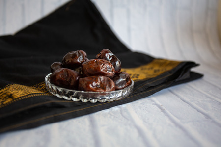 fthar Food evening meal for Ramadan kareem,Concept: Date of Islamic fasting,fruit date placed on a...