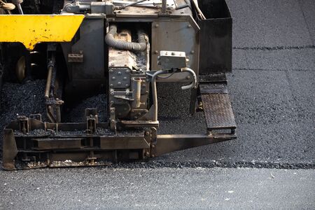 Construction work for a road and highway repairing asphalt road cityの写真素材