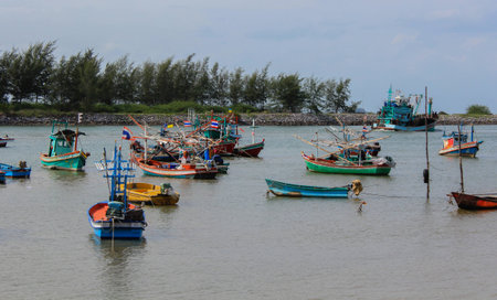 small fishing boat dock in the water