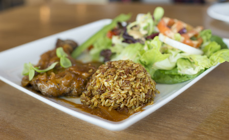 Pork chop steak on wood tableの写真素材