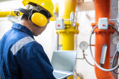 Maintenance technician at a heating plant,Petrochemical workers supervise the operation of gas and...