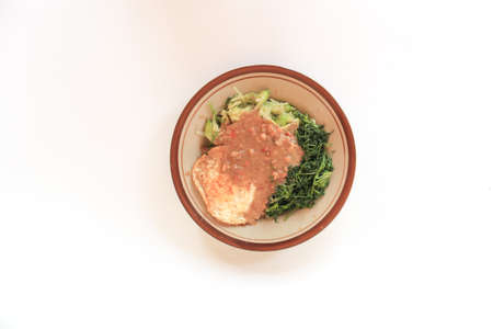 Nasi Pecel. Traditional Javanese rice dish of steamed rice with vegetable salad, peanut dressing, and fried egg.の写真素材