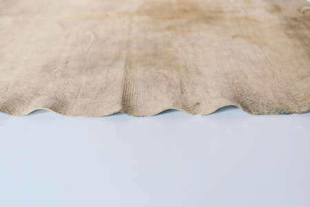 Dirty cleaning rag background texture in white background. Kanebo or Chamois textureの写真素材
