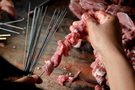 Satay Klatak making process. Sate klathak is a unique goat satay or mutton satay dish, originally...