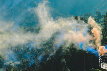 Colourful smog with orange and blue with nature background.の写真素材