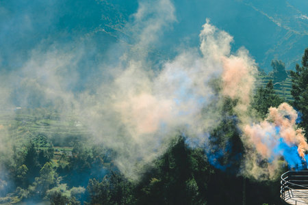 Colourful smog with orange and blue with nature background.の写真素材