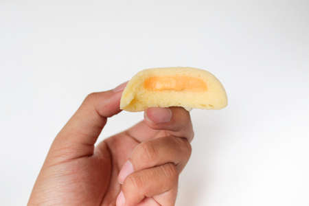 Bakpia Kukus Cake or Steamed Bakpia Cake with Cheese Flavour on hand isolated on white background....