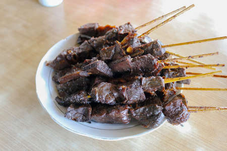 Sate Paru or beef's lung satay with soft texture. Traditional food from Indonesiaの写真素材