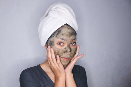 Smile Asian women smiling when she use beauty face maskの写真素材
