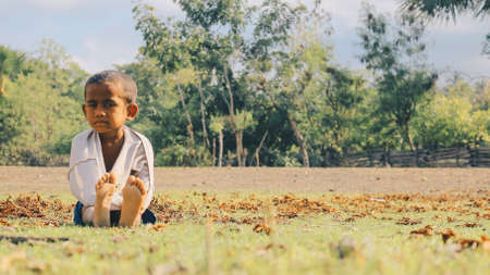 A portrait of Children with a shabby look in a poor and isolated village of Rote Island, East Nusa...