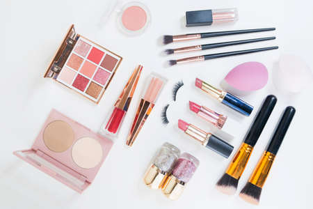Makeup brush and decorative cosmetics on a white background.の写真素材