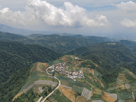 Aerial view of landscape mountain road in Dieng through Batang area, Wonosobo, Indonesia.の写真素材