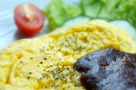 Scrambled eggs with blackpepper sauceの写真素材