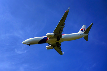 KUALA LUMPUR INTERNATIONAL AIRPORT - July 19 : Boeing 737-8H6 (9M-MXJ) Malaysia Airlines ready to land at Kuala Lumpur International Airport, Malaysia on July 19, 2014.のeditorial素材