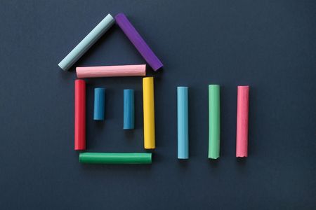 From color slate pencils it is laid out a symbol of the house.の写真素材